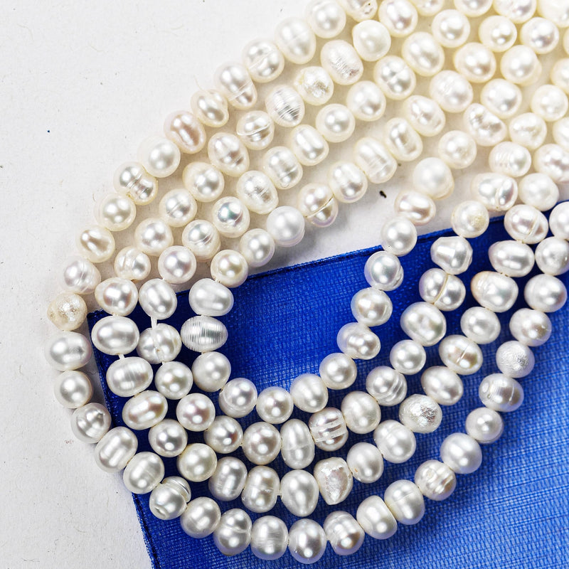 Freshwater pearl strand, white, 4.5*5-6mm potato shape, 14 inches, 0.8mm hole, about 80pcs pearl