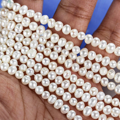 Freshwater pearl strand, white, 4.5*5-6mm potato shape, 14 inches, 0.8mm hole, about 80pcs pearl