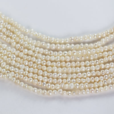 Freshwater pearl strand, white, 2.5mm potato shape, 14 inches, 0.5mm side drilled hole, about 150pcs pearl