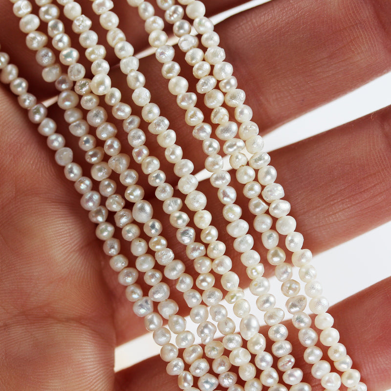 Freshwater pearl strand, white, 2.5mm potato shape, 14 inches, 0.5mm side drilled hole, about 150pcs pearl