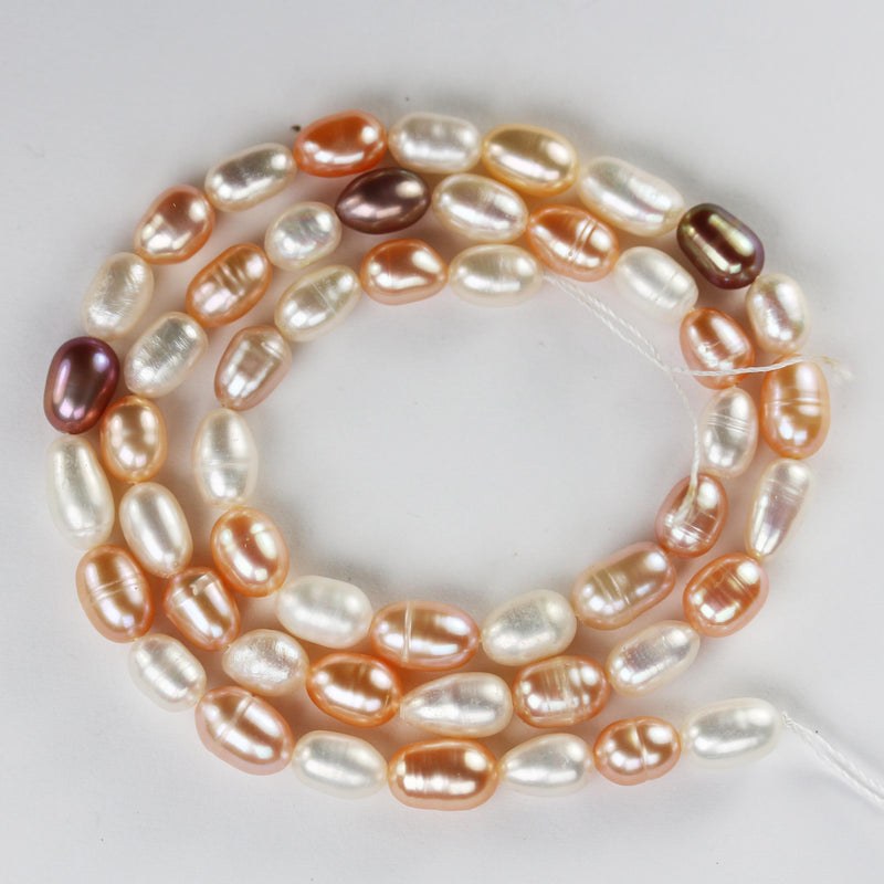 Natural Freshwater pearl strand, mixed cream colors, 5.5-6mm*7-8.5mm potato shape, 14 inches, 0.6mm hole, about 50 pearls