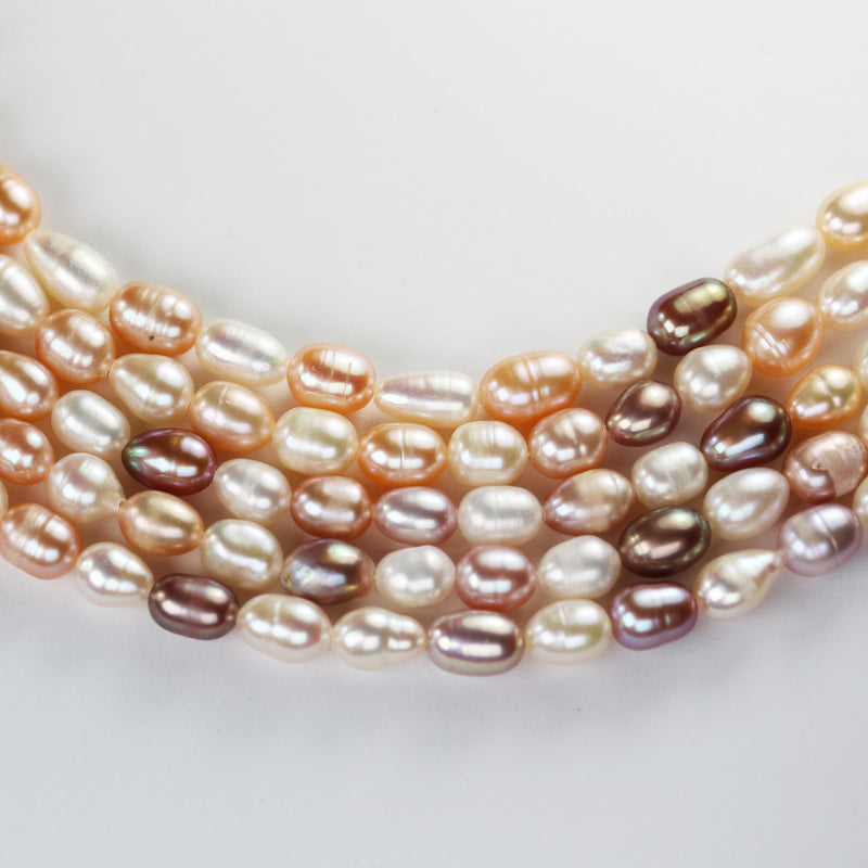 Natural Freshwater pearl strand, mixed cream colors, 5.5-6mm*7-8.5mm potato shape, 14 inches, 0.6mm hole, about 50 pearls