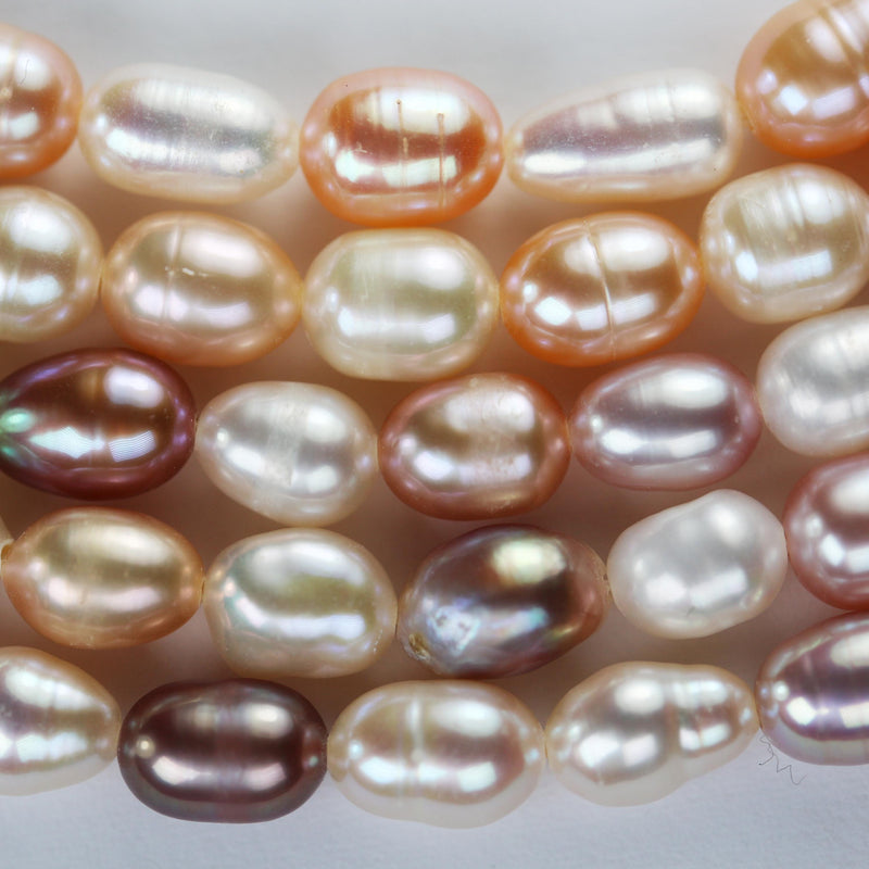 Natural Freshwater pearl strand, mixed cream colors, 5.5-6mm*7-8.5mm potato shape, 14 inches, 0.6mm hole, about 50 pearls