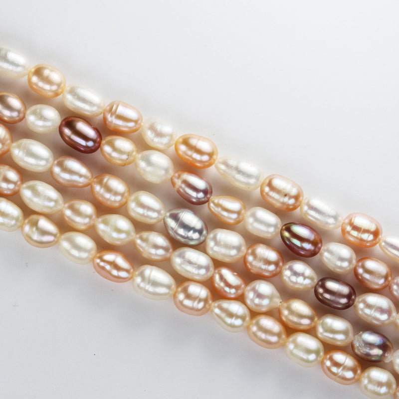 Natural Freshwater pearl strand, mixed cream colors, 5.5-6mm*7-8.5mm potato shape, 14 inches, 0.6mm hole, about 50 pearls