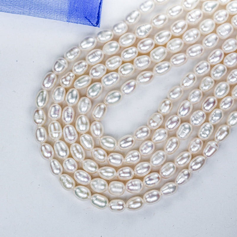 Freshwater pearl strand, white, 5*7mm potato shape, 13", 0.8mm hole, about 53pcs pearl