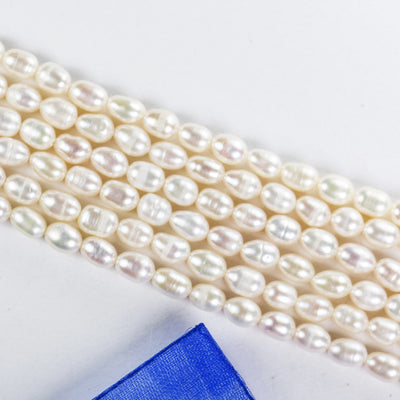 Freshwater pearl strand, white, 5*7mm potato shape, 13", 0.8mm hole, about 53pcs pearl